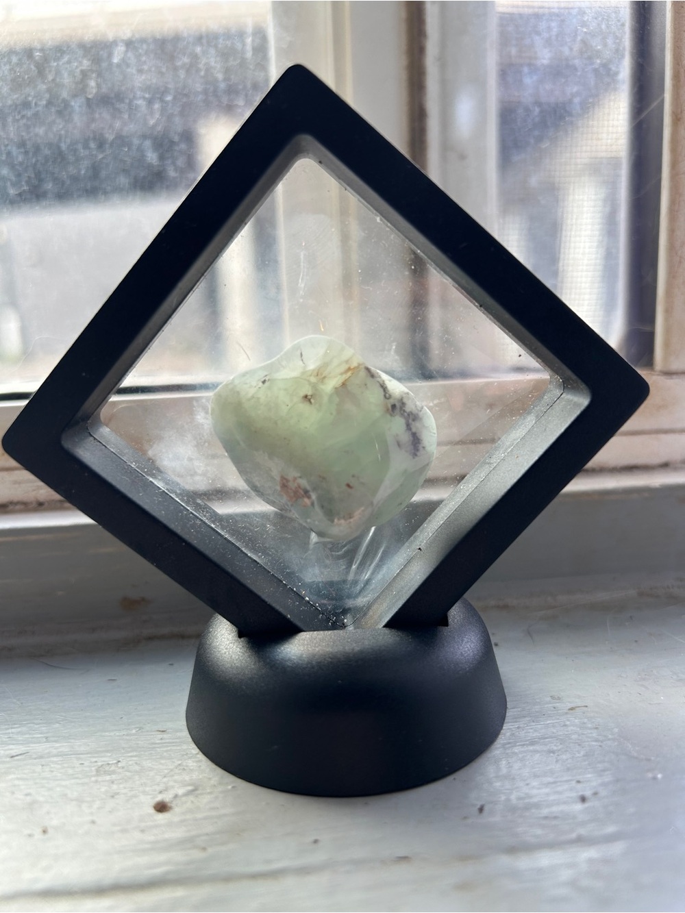 Pale Green Tumbled Stone in Black Floating Display